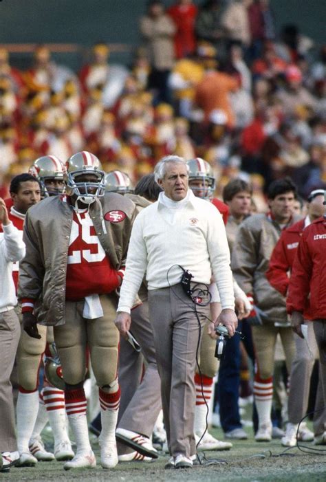 Bill Walsh San Francisco 49ers head coach on sideline 1980s