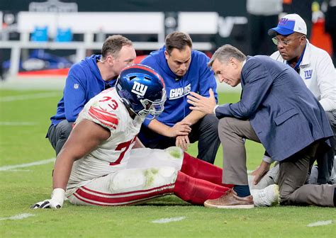 Evan Neal injury history MCL ankle hamstring IR Giants timeline
