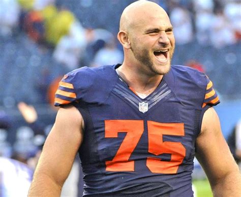 Kyle Long Chicago Bears offensive lineman in uniform at Soldier Field