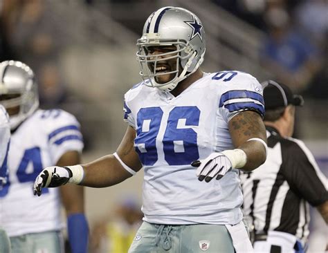 Marcus Spears NFL career stats defensive end Cowboys Ravens tackles sacks